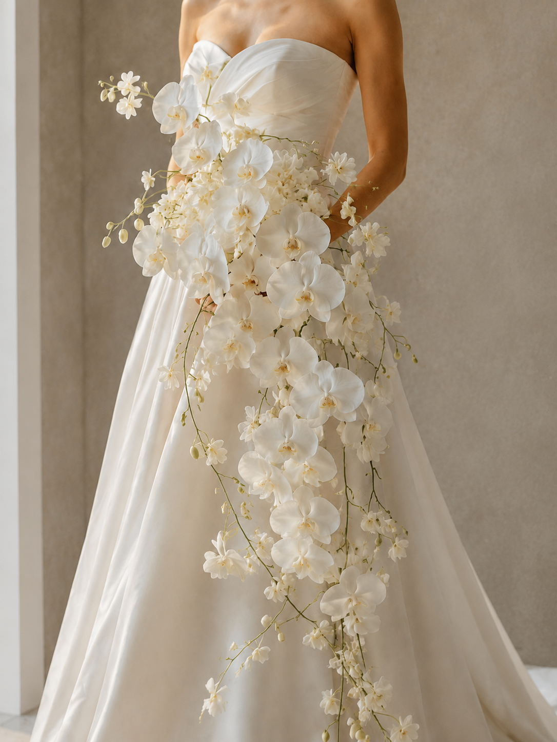 Phalaenopsis Waterfall cascading white orchid bridal bouquet, alternate angle bodice crop